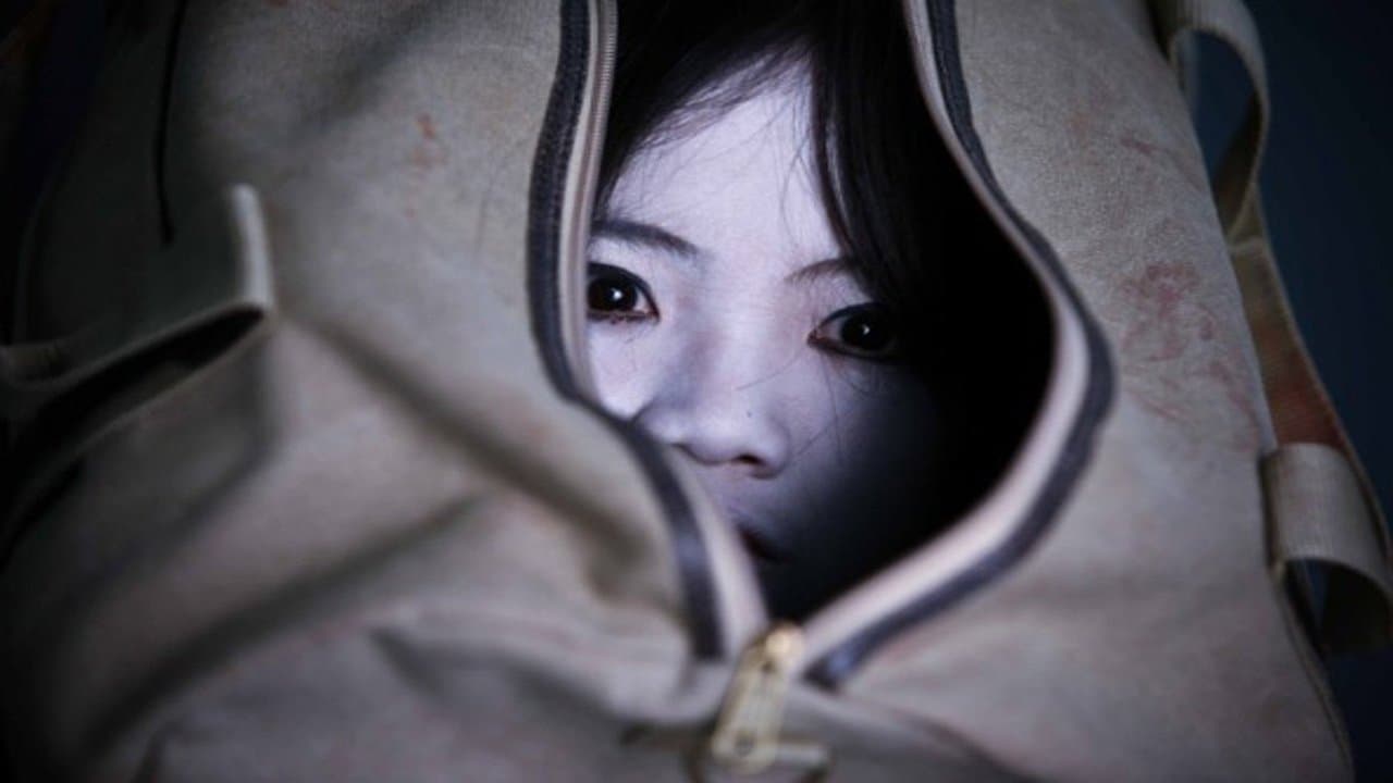 The Grudge: Old Lady in White backdrop